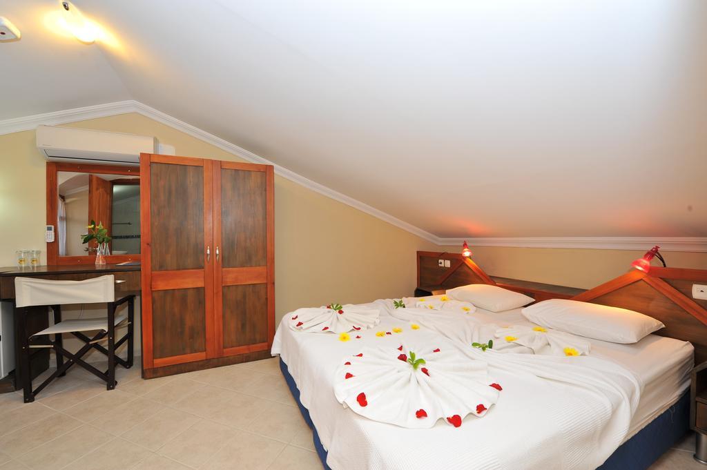 Grenadine Lodge Дальян Номер фото